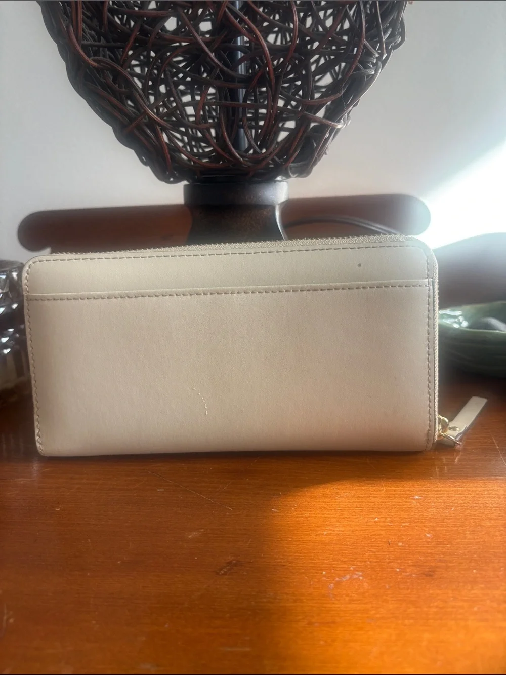kate spade cream zip wallet with gold logo
